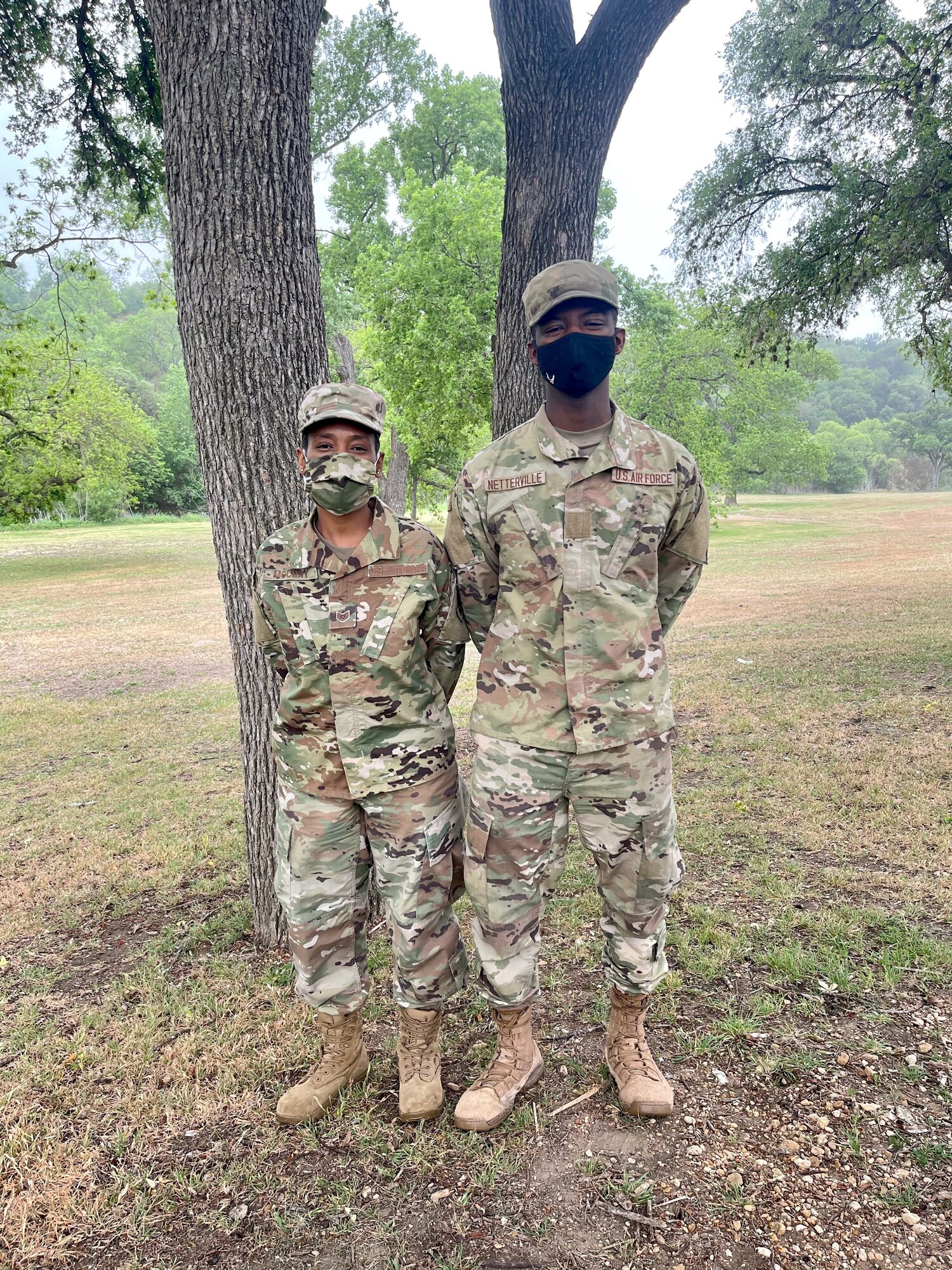 Tech. Sgt. Nessie McCray, 344th Training Squadron, and her son, Airman Basic Jaylen Netterville, 343rd Training Squadron, are shown at Joint Base San Antonio-Lackland, Texas, April 15, 2021. Both look forward to graduating and beginning their new careers. (U.S. Air Force photo by Agnes Koterba)