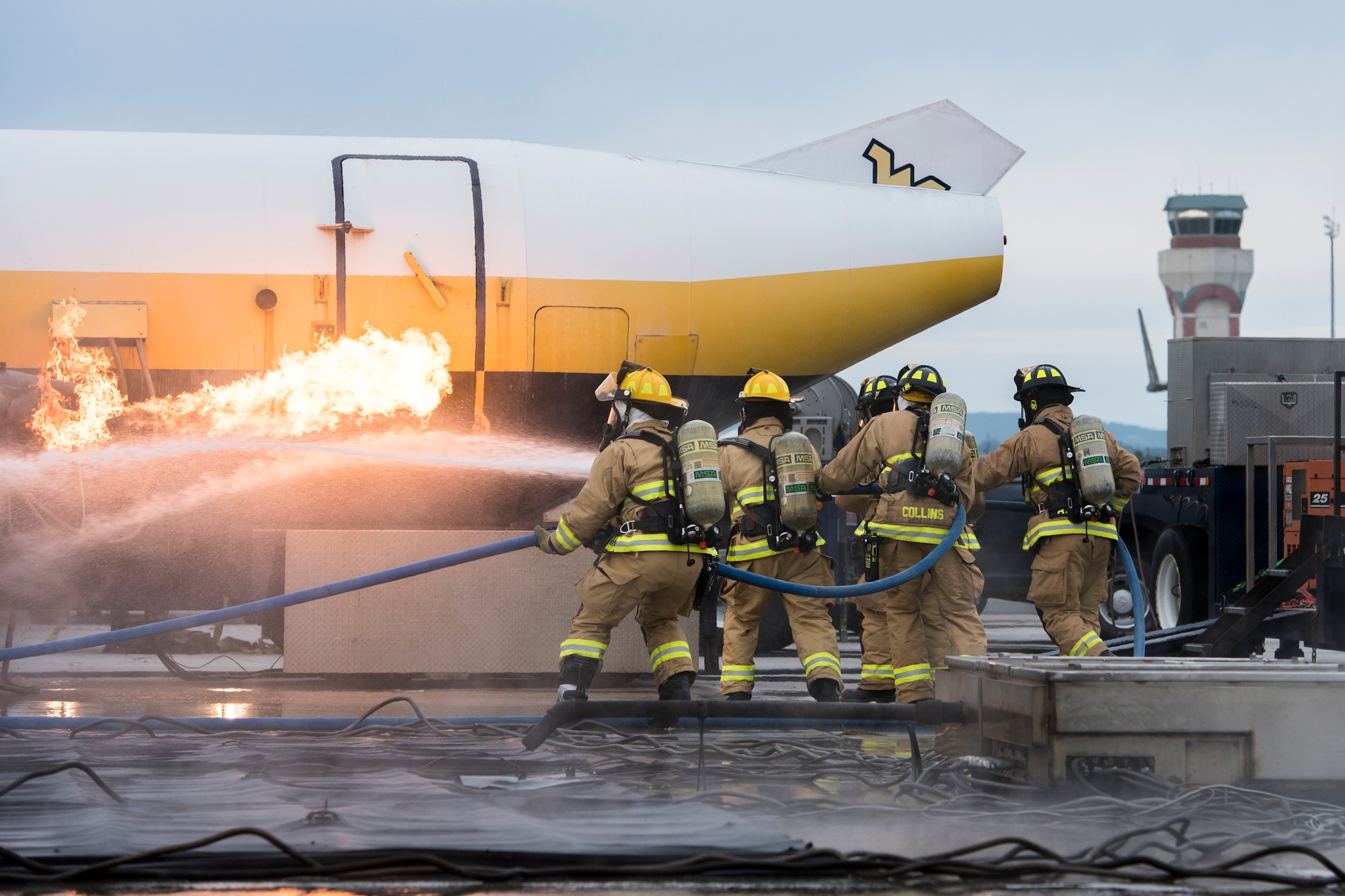 Firefighters from the 167th Airlift Wing, Martinsburg, W. Va., respond to a simulated aircraft fire as part of their Federal Aviation Administration Part 139 Live Fire Training, Oct. 14, 2018. (U.S. Air National Guard photo by Senior Airman Edward Michon)