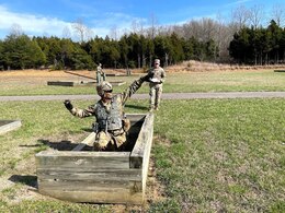 soldier throws hand grenade