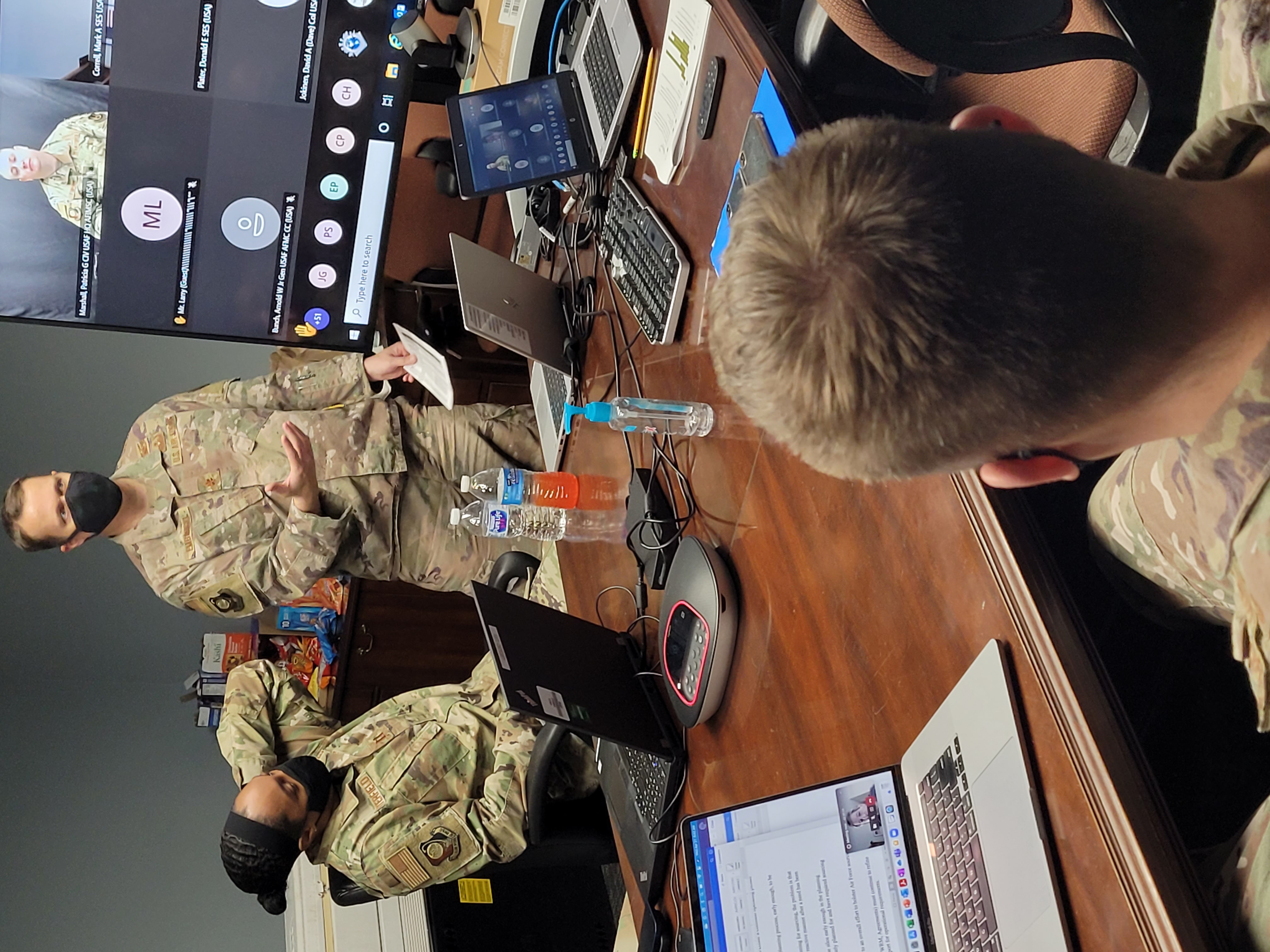 Maj. Steve Emborski, team coordinator (standing), preps team chairpersons prior to the Installation and Mission Support Weapons and Tactics Conference out-briefs April 21 at Joint Base San Antonio-Lackland, Texas. Four teams tasked with tackling the Air and Space Forces’ most significant Agile Combat Support challenges presented their recommendations to a virtual audience of more than 500 Air and Space Force senior officials, mission support leaders and their peers. The Air Force will now analyze the teams’ ideas to determine their feasibility. (U.S. Air Force photo by Joe Bela)