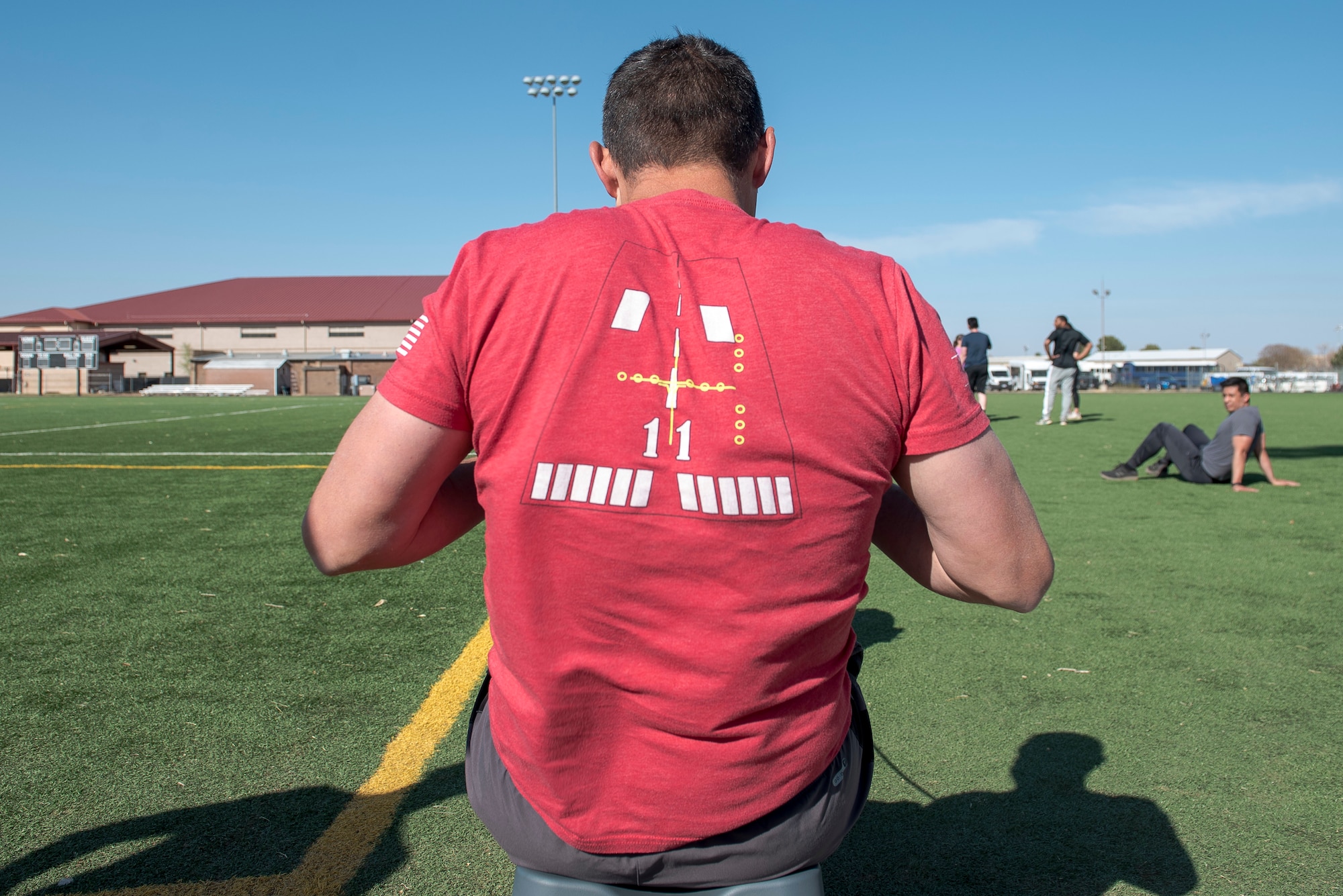 A participant of the 2nd Annual Reaper Smoke Competition & Symposium performs rows as part of the fitness competition at Cannon Air Force Base, N.M., April 13, 2021. Reaper Smoke includes 25 different squadrons, from Active Duty, Guard, and Reserve groups. (U.S. Air Force photo by Senior Airman Vernon R. Walter III)