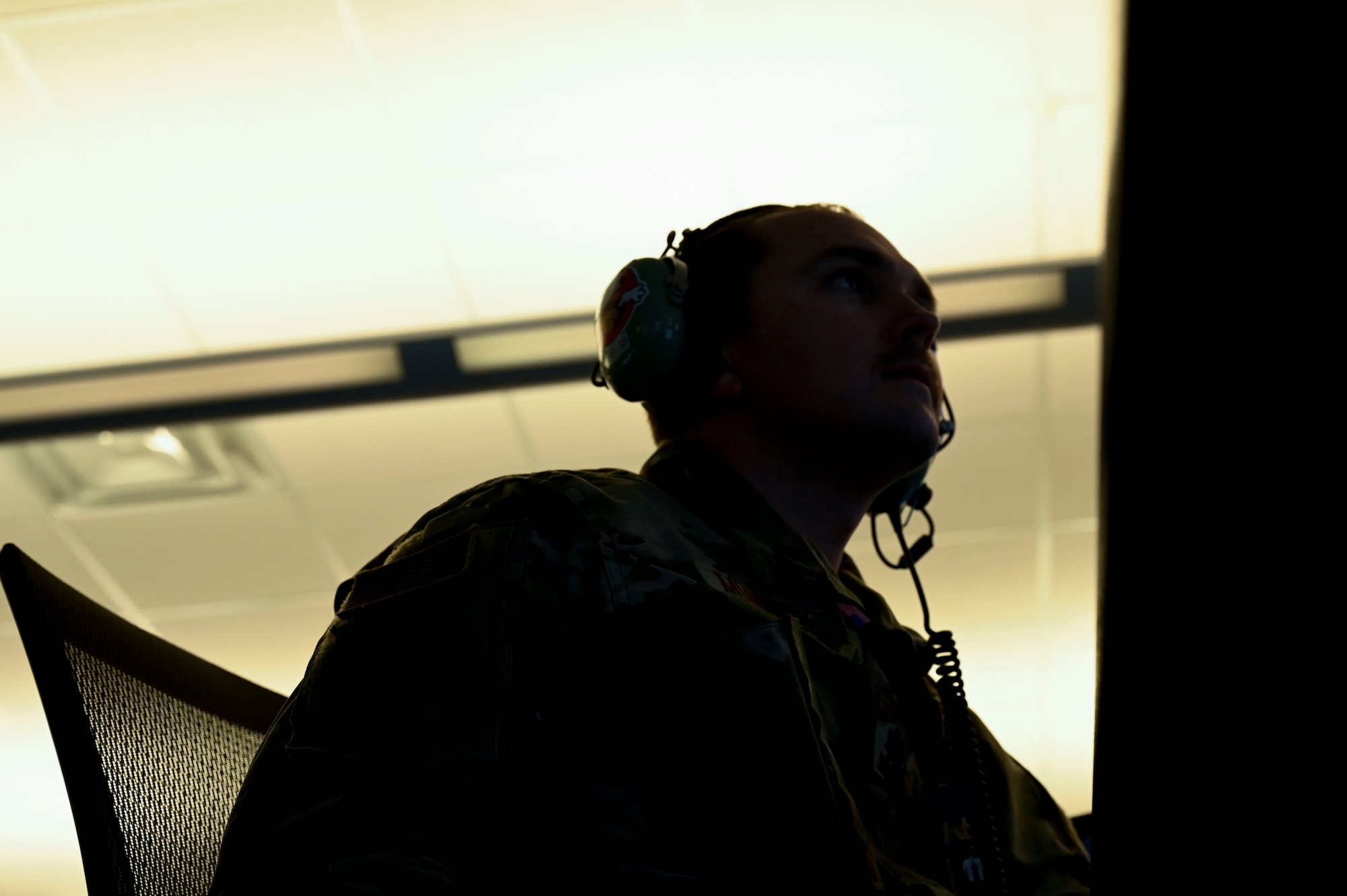 A member from the 727th Expeditionary Air Control Squadron (EACS) “Kingpin” works at his station, at Shaw Air Force Base, South Carolina, April 21, 2021. Kingpin is a tactical command and control unit that serves as the lead control and reporting center and directly provides the Combined Air Operations Center with a common air picture, enabling the completion of air operations across the US Central Command area of responsibility. The 727th EACS repositioned from Al Dhafra Air Base and began full operations April 20 from Shaw AFB. (U.S. Air Force photo by Tech. Sgt. E’Lysia A. Wray)