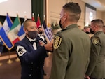 JOINT BASE SAN ANTONIO-LACKLAND, Texas --Approximately 150 members of the Inter-American Air Forces Academy and distinguished guests gathered at a graduation for nearly 60 students from partner nations and the U.S. Air Force here April 15, 2021.