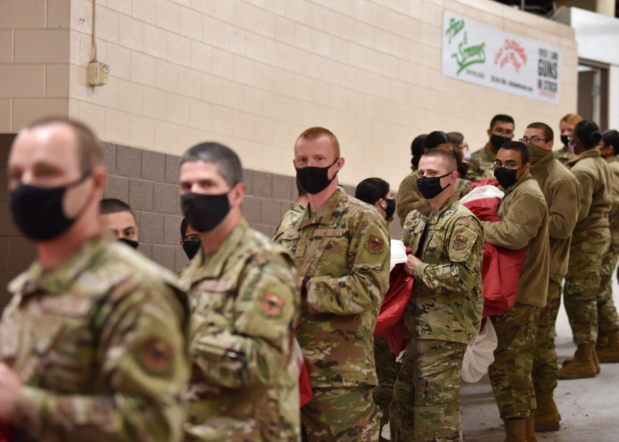 Service Members from Goodfellow Air Force Base prepare for the opening event at the Foster Communications Coliseum in San Angelo, Texas, April 21, 2021. The troops were a part of opening events for Military Appreciation Night, celebrating the military for protecting our nation’s freedom. (U.S. Air Force photo by Staff Sgt. Seraiah Wolf)