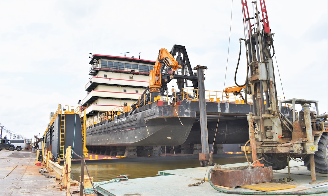 IN THE PHOTO, a photo of the Memphis District’s Dredge Hurley on the Ensley Engineer Yard dry dock, getting repaired after much of the south, including Memphis, Tennessee, was hit hard with frigid temperatures in mid-February this year. From frozen pipes to no electricity, many people and structures were impacted by the icy weather, including the district’s Dredge Hurley. It took approximately one month and multiple Ensley Engineer Yard crews to thaw out and repair the dredge. Now that the Dredge Hurley is thawed and repaired, it’s ready to dredge the Mississippi River, which is scheduled to start within the next two weeks. (USACE photo by Jessica Haas)