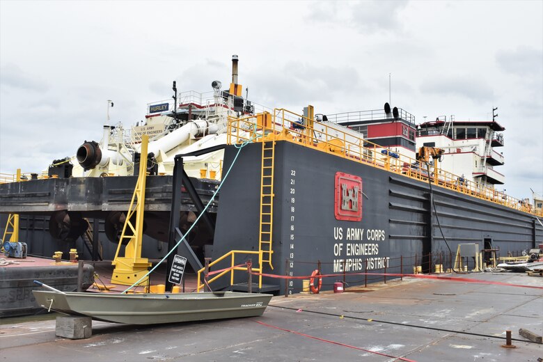 IN THE PHOTO, a photo of the Memphis District’s Dredge Hurley on the Ensley Engineer Yard dry dock, getting repaired after much of the south, including Memphis, Tennessee, was hit hard with frigid temperatures in mid-February this year. From frozen pipes to no electricity, many people and structures were impacted by the icy weather, including the district’s Dredge Hurley. It took approximately one month and multiple Ensley Engineer Yard crews to thaw out and repair the dredge. Now that the Dredge Hurley is thawed and repaired, it’s ready to dredge the Mississippi River, which is scheduled to start within the next two weeks. (USACE photo by Jessica Haas)