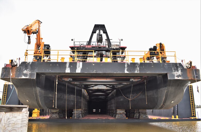 IN THE PHOTO, a photo of the Memphis District’s Dredge Hurley on the Ensley Engineer Yard dry dock, getting repaired after much of the south, including Memphis, Tennessee, was hit hard with frigid temperatures in mid-February this year. From frozen pipes to no electricity, many people and structures were impacted by the icy weather, including the district’s Dredge Hurley. It took approximately one month and multiple Ensley Engineer Yard crews to thaw out and repair the dredge. Now that the Dredge Hurley is thawed and repaired, it’s ready to dredge the Mississippi River, which is scheduled to start within the next two weeks. (USACE photo by Jessica Haas)