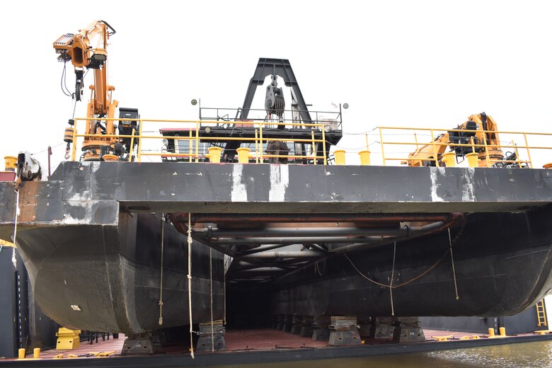 IN THE PHOTO, a photo of the Memphis District’s Dredge Hurley on the Ensley Engineer Yard dry dock, getting repaired after much of the south, including Memphis, Tennessee, was hit hard with frigid temperatures in mid-February this year. From frozen pipes to no electricity, many people and structures were impacted by the icy weather, including the district’s Dredge Hurley. It took approximately one month and multiple Ensley Engineer Yard crews to thaw out and repair the dredge. Now that the Dredge Hurley is thawed and repaired, it’s ready to dredge the Mississippi River, which is scheduled to start within the next two weeks. (USACE photo by Jessica Haas)