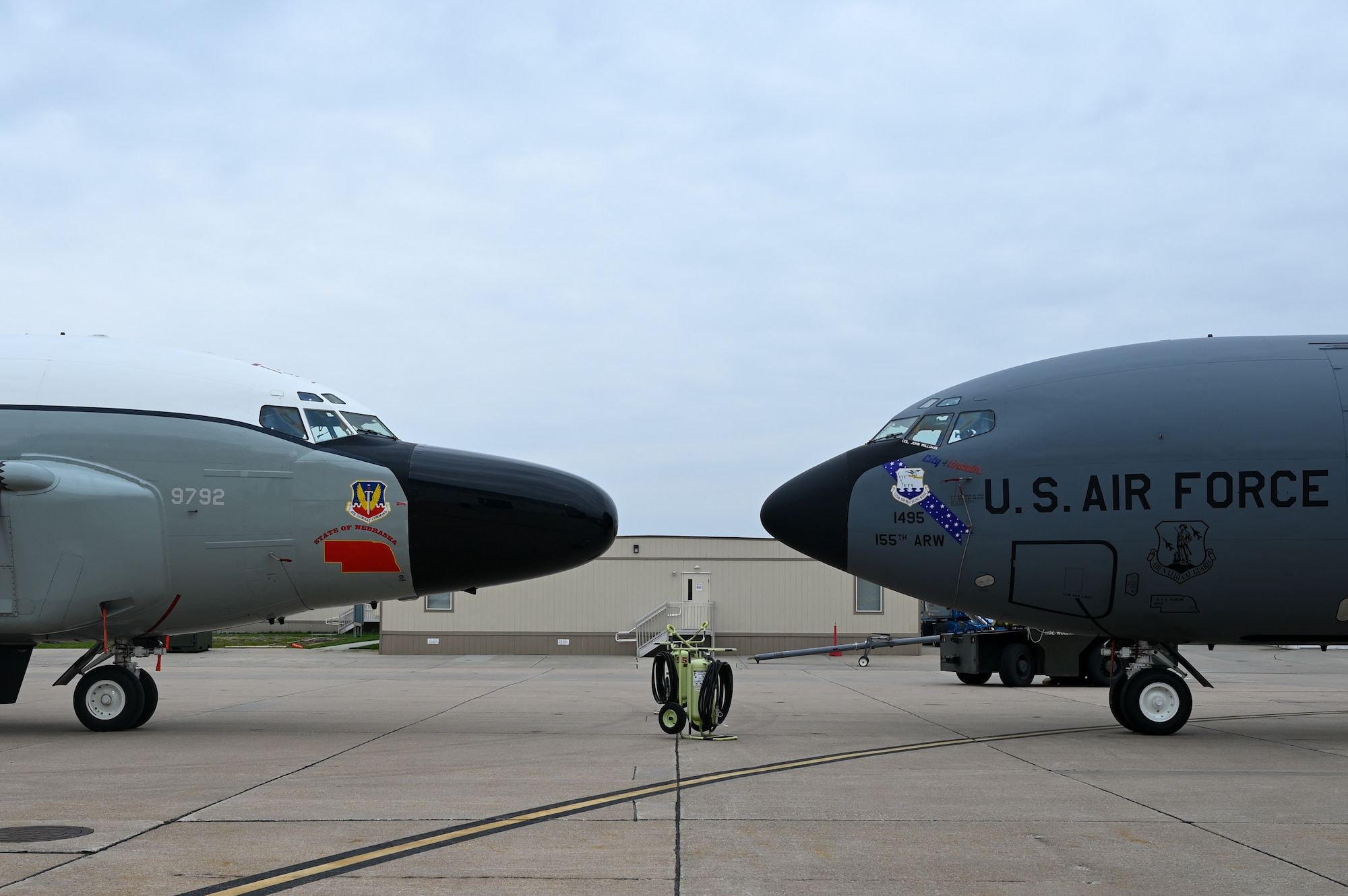 Photo of front part of two aircraft facing almost nose to nose