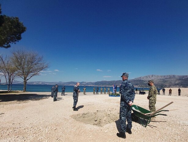 210417-N-NO901-0001 SPLIT, Croatia (April 17, 2021) The U.S. breaks ground with Ministry of Defense on a training facility at Lora Naval Base in Split, Croatia.  The groundbreaking ceremony marked the beginning of construction on a project with a total program value of nearly 10 million kuna, including construction, training, and equipment provided by the U.S. This facility will advance Croatia’s underwater mine-clearance capabilities, with the benefit of training by the U.S. Navy’s Sixth Fleet Explosive Ordinance Disposal Mobile Unit (EODMU8). Cooperation and joint training with Croatian mine-clearance divers enhances U.S.-Croatia interoperability at sea. The Croatian Navy contributes to increasing collective security and improved freedom of navigation through NATO and recent participation in Sea Guardian. This project bolsters the U.S.-Croatia partnership at sea and coordination between the U.S. Navy and Croatia’s Navy. (U.S. Navy photo courtesy U.S. Embassy Zagreb)