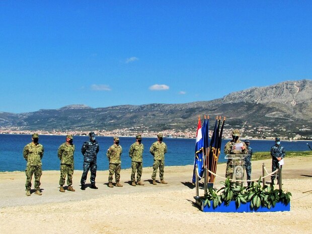 210417-N-NO901-0002 SPLIT, Croatia (April 17, 2021) The U.S. breaks ground with Ministry of Defense on a training facility at Lora Naval Base in Split, Croatia.  The groundbreaking ceremony marked the beginning of construction on a project with a total program value of nearly 10 million kuna, including construction, training, and equipment provided by the U.S. This facility will advance Croatia’s underwater mine-clearance capabilities, with the benefit of training by the U.S. Navy’s Sixth Fleet Explosive Ordinance Disposal Mobile Unit (EODMU8). Cooperation and joint training with Croatian mine-clearance divers enhances U.S.-Croatia interoperability at sea. The Croatian Navy contributes to increasing collective security and improved freedom of navigation through NATO and recent participation in Sea Guardian. This project bolsters the U.S.-Croatia partnership at sea and coordination between the U.S. Navy and Croatia’s Navy. (U.S. Navy photo courtesy U.S. Embassy Zagreb)