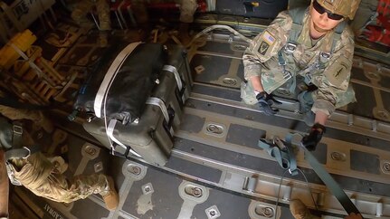 Capt. Theodore Tatum, a logistician with the Washington National Guard, prepares for a supply air drop in support of Special Operations Task Force-North West Africa. Tatum is stationed at Baumholder, Germany, and has been supporting the mission for 15 months.