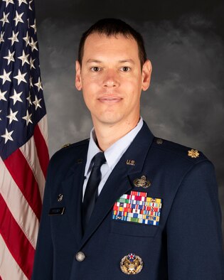 U.S. Air Force Maj. Timothy Kirchner, 422nd Air Base Squadron commander, poses for an official photo at Royal Air Force Croughton, England. (Courtesy Photo)