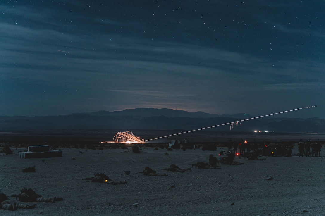 U.S. Marines with 2nd Battalion, 4th Marines, 5th Marine Regiment, 1st Marine Division, provide security during Assault Support Training 4 while participating in Weapons and Tactics Instructor, Course 2-21, which runs concurrently with Integrated Training Exercise, 3-21 at Marine Corps Air Ground Combat Center, Twentynine Palms, Calif., April 20, 2021. The purpose of WTI is to train the next generation of Weapons and Tactics Instructors who will return to their squadrons as experts in tactical flight planning and execution. The purpose of ITX is to create a challenging, realistic training environment that produces combat-ready forces capable of operating as a Marine Air Ground Task Force.