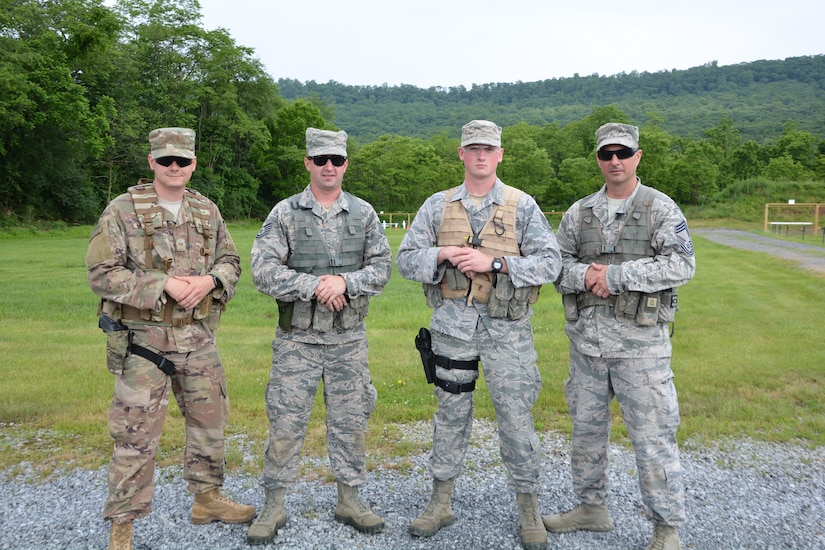 This year's winning team of the Pennsylvania National Guard Combined Arms Match: Senior Airman Nicholas Yakovich, Tech. Sgt. Shawn McCreary, Staff Sgt. Robert Lydic and Chief Master Sgt. Edward Altmyer. All are assigned to the 171st Air Refueling Wing, Pennsylvania National Guard. The two-day six event competition was held at Fort Indiantown Gap, Pennsylvania May 31 to June 2. (U.S. Army National Guard photo by Lt. Col. Angela King-Sweigart)