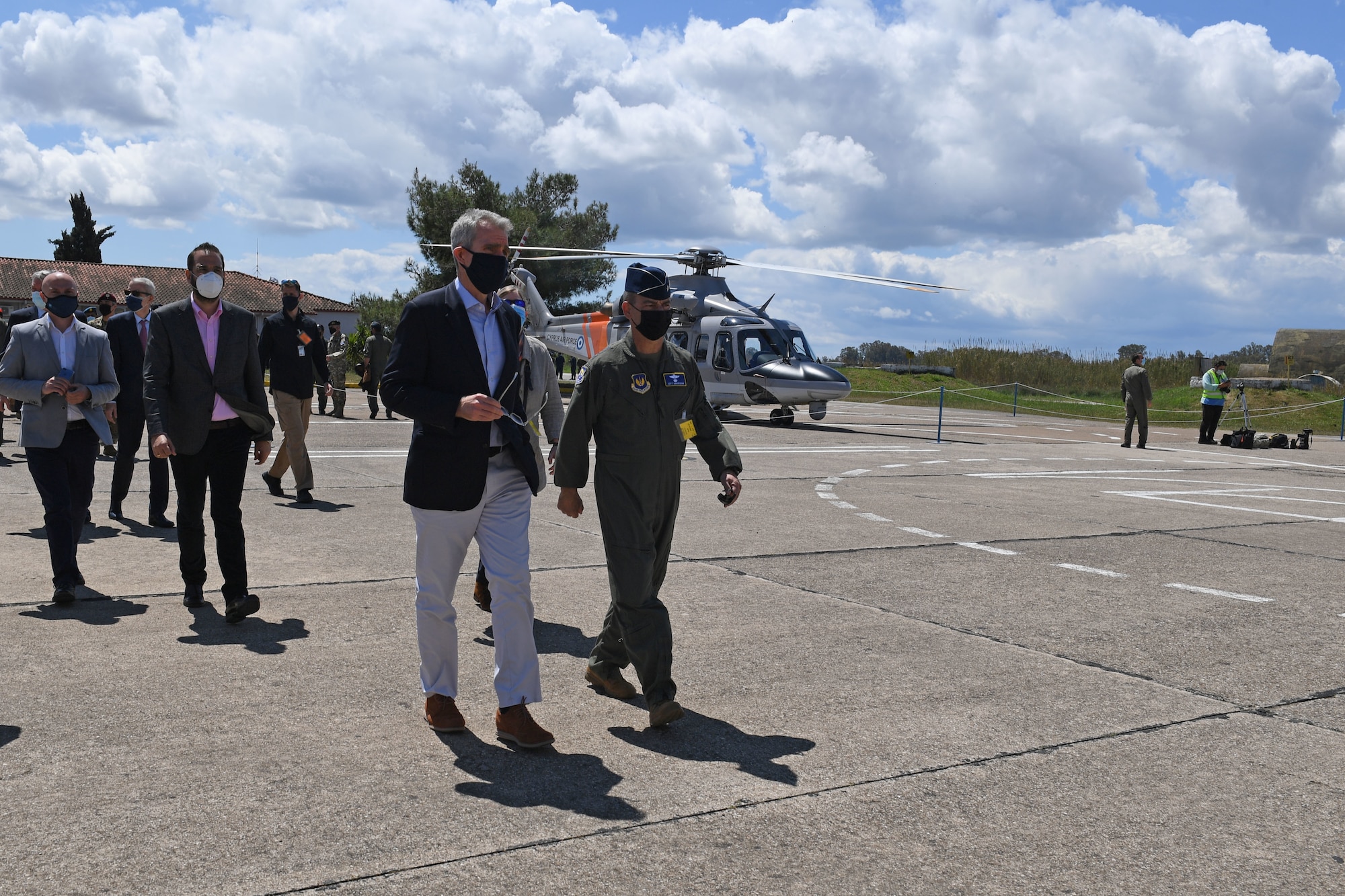 U.S. Air Force Gen. Jeff Harrigian, U.S. Air Forces in Europe and Air Forces Africa commander, speaks with Geoffrey Pyatt, U.S. Ambassador to the Hellenic Republic, during INIOCHOS 21 at Andravida Air Base, Greece, April 20, 2021. The exercise aims to enhance combat readiness and fighting capability, while providing participants the opportunity to develop capabilities planning and conduct complex air operations in a multinational, joint force environment. Additional U.S. forces participating include KC-135 Stratotanker aircraft assigned to the 100th Air Refueling Wing, RAF Mildenhall, England, Joint Terminal Attack Controllers assigned to the 2nd Air Support Operations Squadron, Vilseck, Germany, and MQ-9 Reaper aircraft assigned to the 731st Expeditionary Attack Squadron, flying out of Campia Turzii, Romania. (U.S. Air Force photo by Staff Sgt. Valerie Halbert)