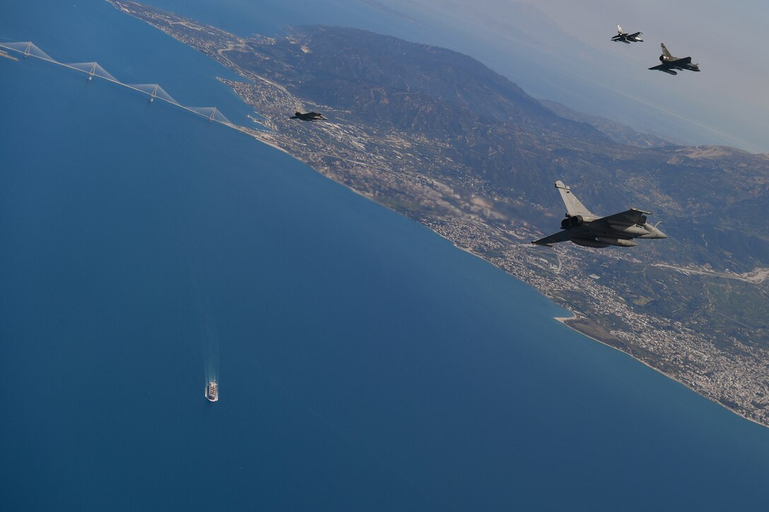 Aircraft from multiple countries participating in INIOCHOS 21 fly over Greece, April 22, 2021. Participation in INIOCHOS 21 helps U.S. Air Force pilots develop and improve air readiness and interoperability with allied and partner air forces. (U.S. Air Force photo by Airman 1st Class Thomas S. Keisler IV)
