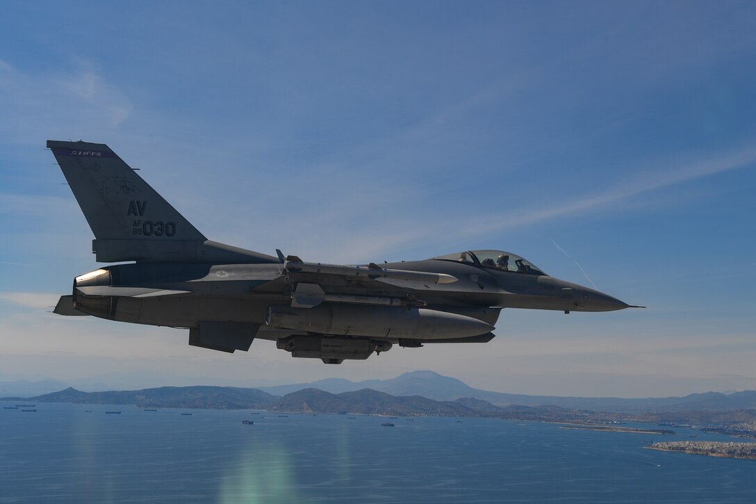 A U.S. Air Force F-16 Fighting Falcon from the 510th Fighter Squadron (FS) soars above Greece, April 22, 2021. The 510th FS operated out of Andravida Air Base, Greece, while participating in INIOCHOS 21, an annual exercise designed to provide advanced and realistic aircrew training to strengthen interoperability of allied and partner air forces during joint operations and air defenses. (U.S. Air Force photo by Airman 1st Class Thomas S. Keisler IV)