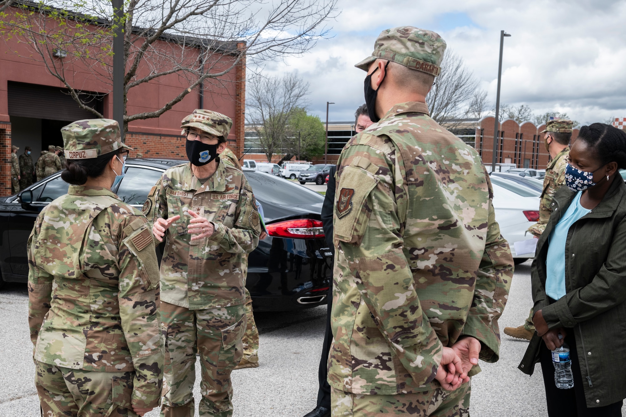 U.S. Air Force Gen. Jacqueline Van Ovost, Air Mobility Command commander, recognizes Master Sgt. Tiana Corpuz, 932nd Civil Engineer Squadron, as a star performer from the 932nd Airlift Wing, at Scott Air Force Base, Illinois, April 10, 2021. Maj. Jason Caranta, 932nd CES, nominated Corpuz for her outstanding work in the recent months in her new position. (U.S. Air Force photo by Senior Airman Brooke Spenner)