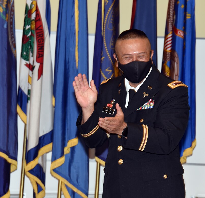 Chief Warrant Officer 5 Jesus C. Tulud reacts to a speaker during his retirement ceremony April 15 at Fort Detrick, Maryland. Tulud devoted the majority of his 33-year career to improving the Army’s medical logistics enterprise. (Photo Credit: C.J. Lovelace)