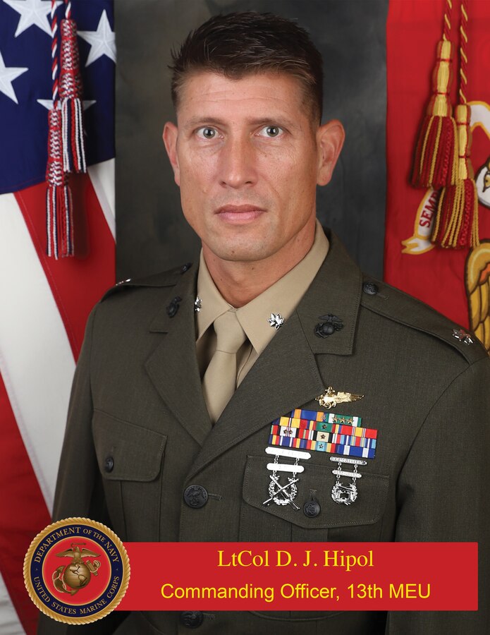 U.S. Marine Corps Lt. Col. Daniel J. Hipol assumes command of the 13th Marine Expeditionary Unit during a Transfer of Authority ceremony at Marine Corps Base Camp Pendleton, Calif.