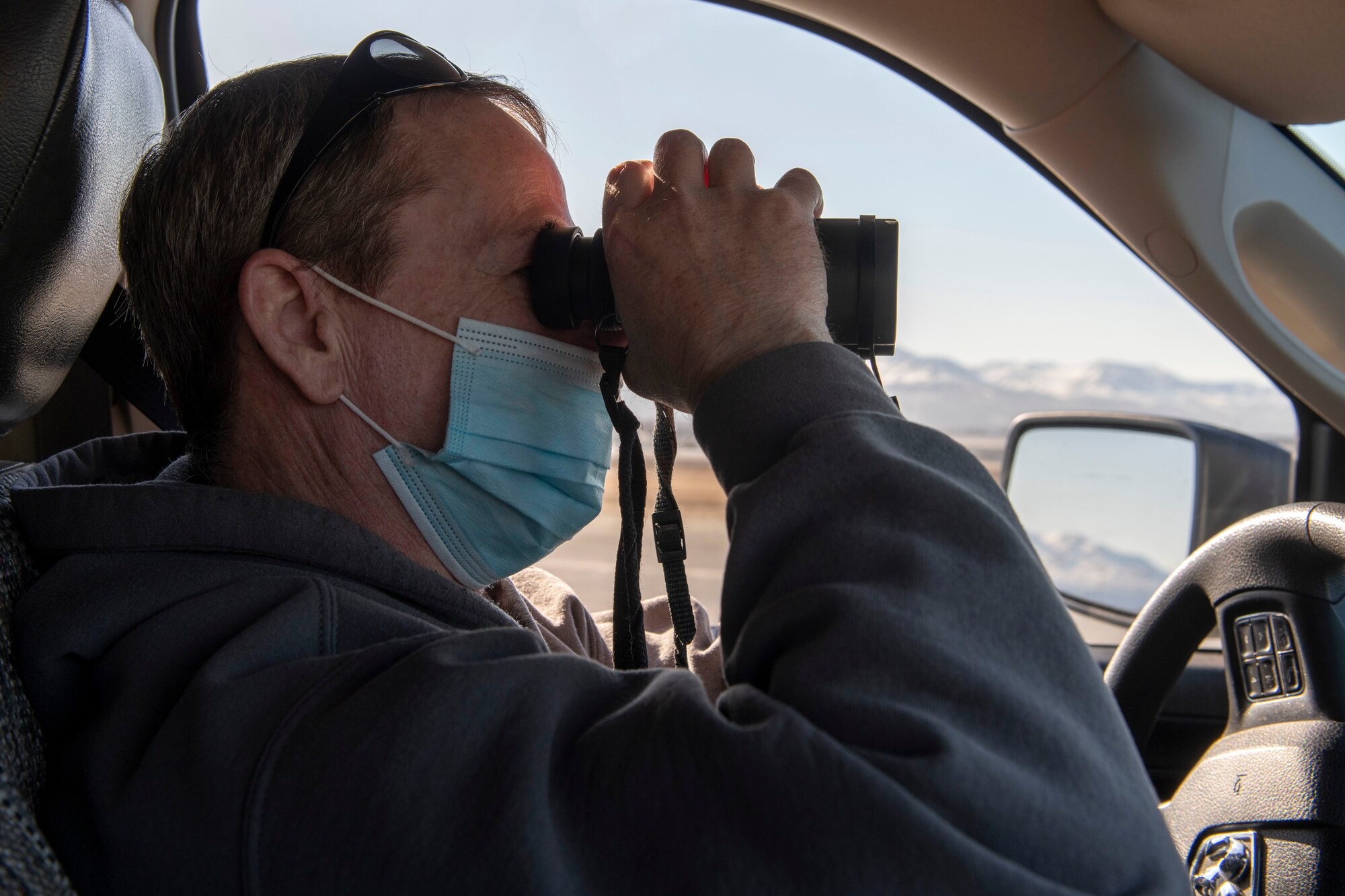 Jerry Morrill, the 3rd Wing Bird and Wildlife Strike Hazard project leader, canvasses the airfield for birds at Joint Base Elmendorf-Richardson, Alaska, April 21, 2021. The BASH program uses multiple bird-deterrent methods to keep JBER’s aircraft flying without incident. In 1995, an E-3 Sentry Airborne Warning and Control System taking off collided with Canada geese; 24 crew members, including two Canadian armed forces personnel, were killed in the crash. Bird mitigation efforts have prevented such accidents since.