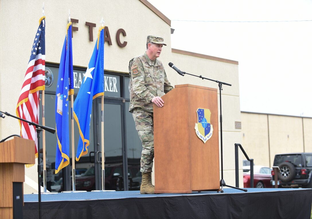 Man standing at podium