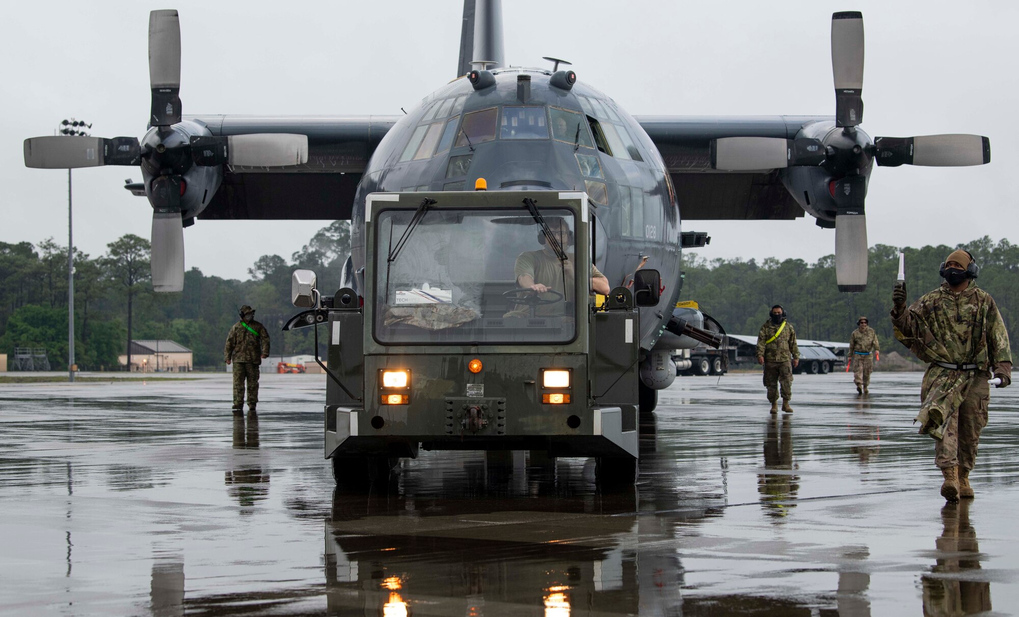 Air Commandos with the 1st Special Operations Aircraft Maintenance Squadron tow an AC-130U “Spooky” gunship to the airpark at Hurlburt Field, Florida, April 17, 2021.