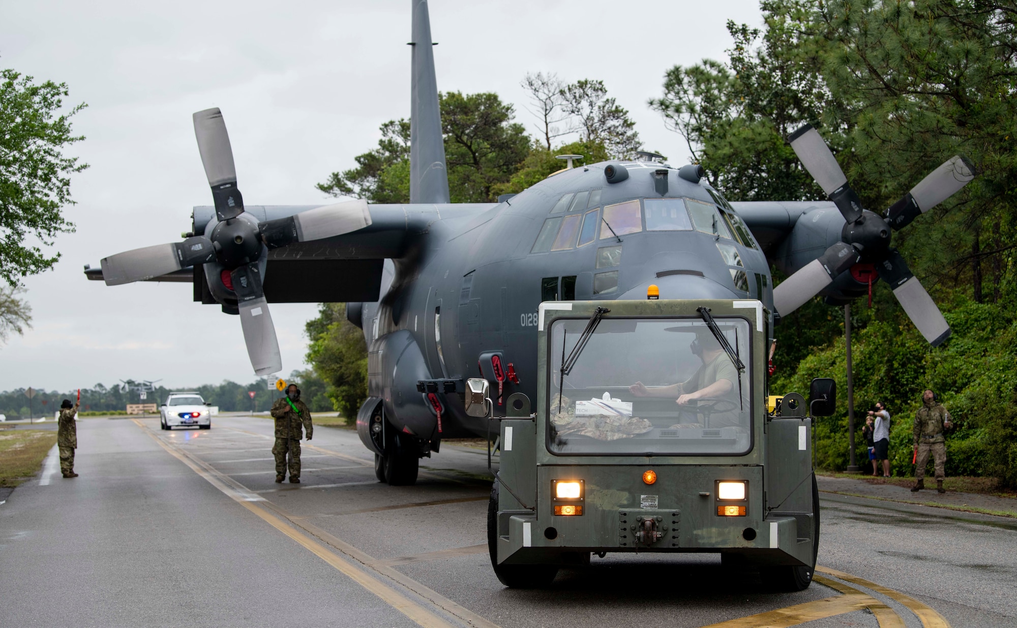 Air Commandos with the 1st Special Operations Aircraft Maintenance Squadron tow an AC-130U “Spooky” gunship to the airpark at Hurlburt Field, Florida, April 17, 2021.