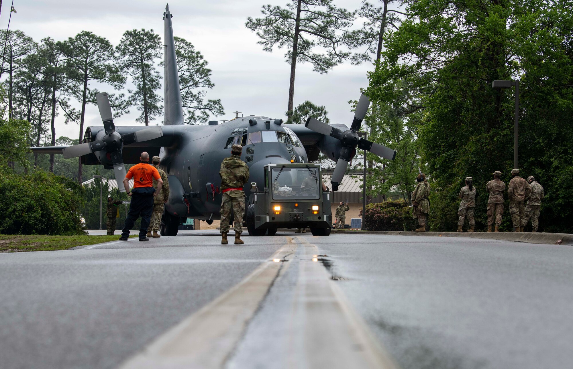 Air Commandos with the 1st Special Operations Aircraft Maintenance Squadron tow an AC-130U “Spooky” gunship to the airpark at Hurlburt Field, Florida, April 17, 2021