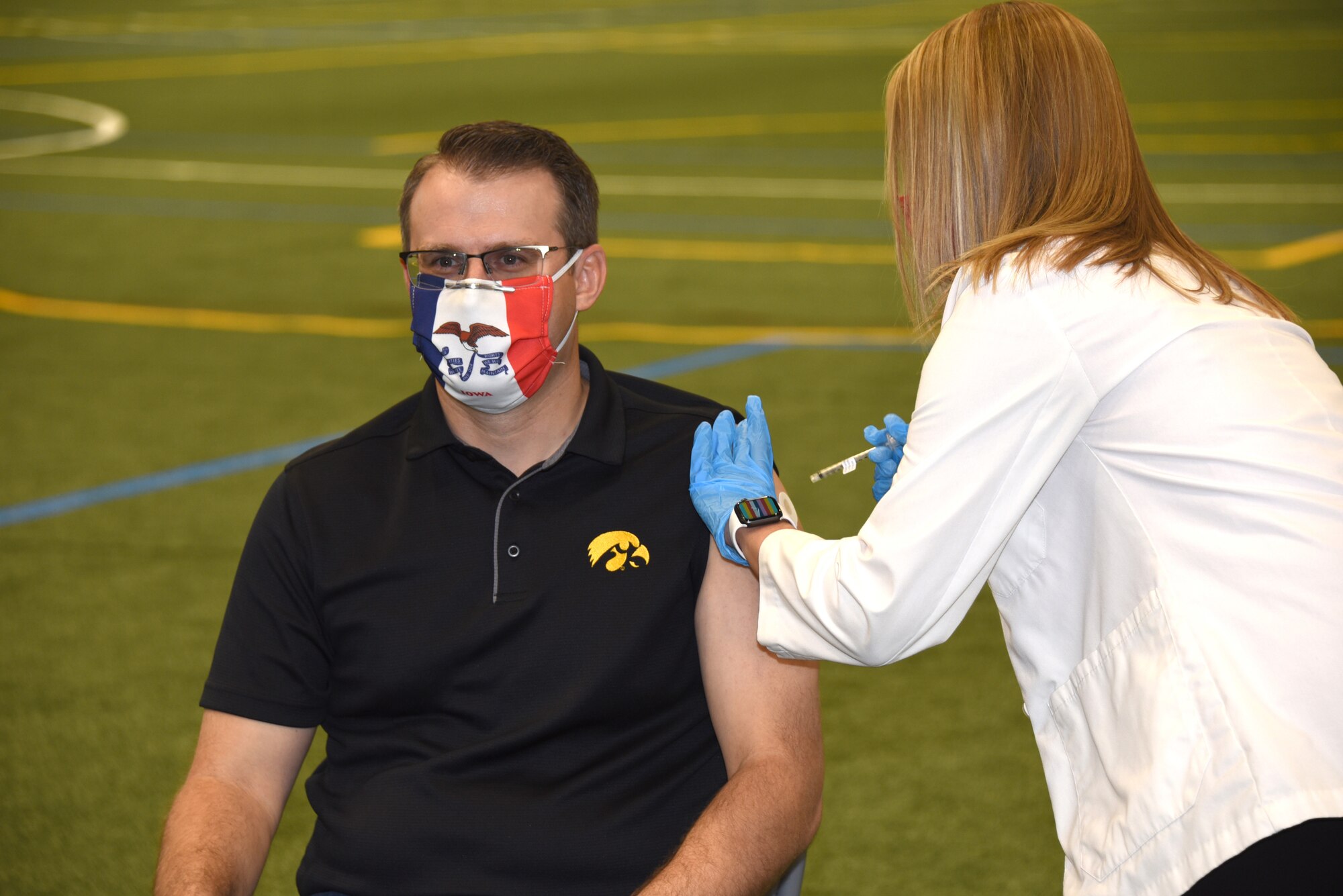 Iowa Lt. Gov. Adam Gregg receives a COVID-19 vaccination at vaccination clinic held at the Siouxland Expo Center in Sioux City, Iowa on April 23, 2021.