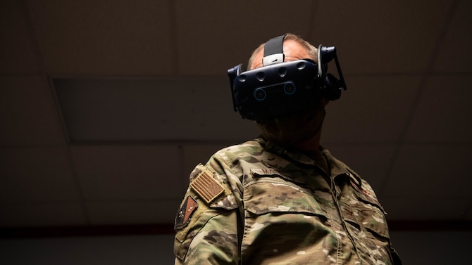 U.S. Air Force Col. Robert Masaitis, 27th Special Operations Wing commander, experiences an MC-130J Commando II aircraft virtual reality maintenance training program during an Air Education and Training Command Integrated Technology Platform demonstration April 15, 2021, at Cannon Air Force Base, N.M. Masaitis and other wing leaders learned how fully functioning VR programs are ready to roll out to squadrons and how they can assimilate the technology into current and future operations. (U.S. Air Force photo by Staff Sgt. Peter Reft)