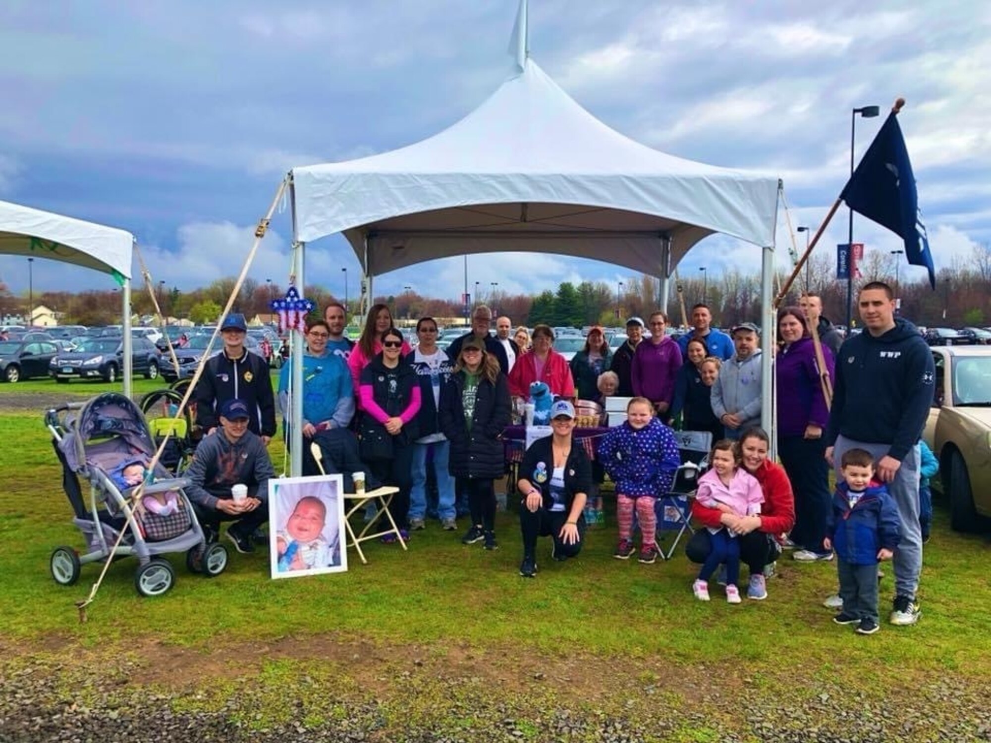 U.S. Air Force Master Sgt. Jessica Roy (front center), 103rd Security Forces Squadron S2 intelligence and investigations superintendent and antiterrorism program manager, and members of “Team Austin Roy,” including members of the Roy family and Airmen from the 103rd Airlift Wing, at the Greater Hartford March for Babies at Pratt and Whitney Stadium at Rentschler Field in East Hartford, Connecticut, April 29, 2018. Roy has dedicated the years following her infant son’s passing in 2012 to advocacy work with the March of Dimes organization. (Courtesy photo)