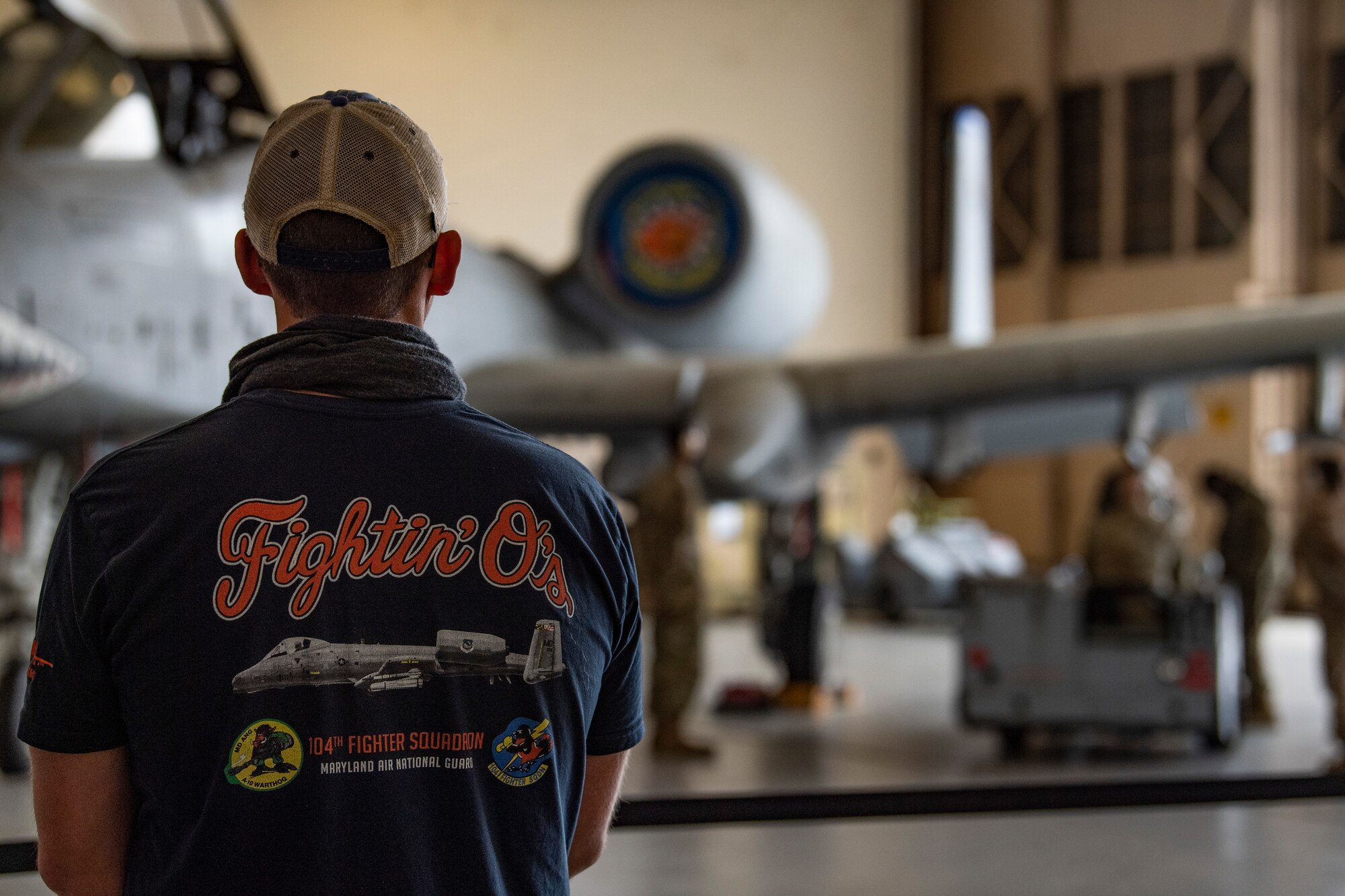 A photo of a pilot watching a competition