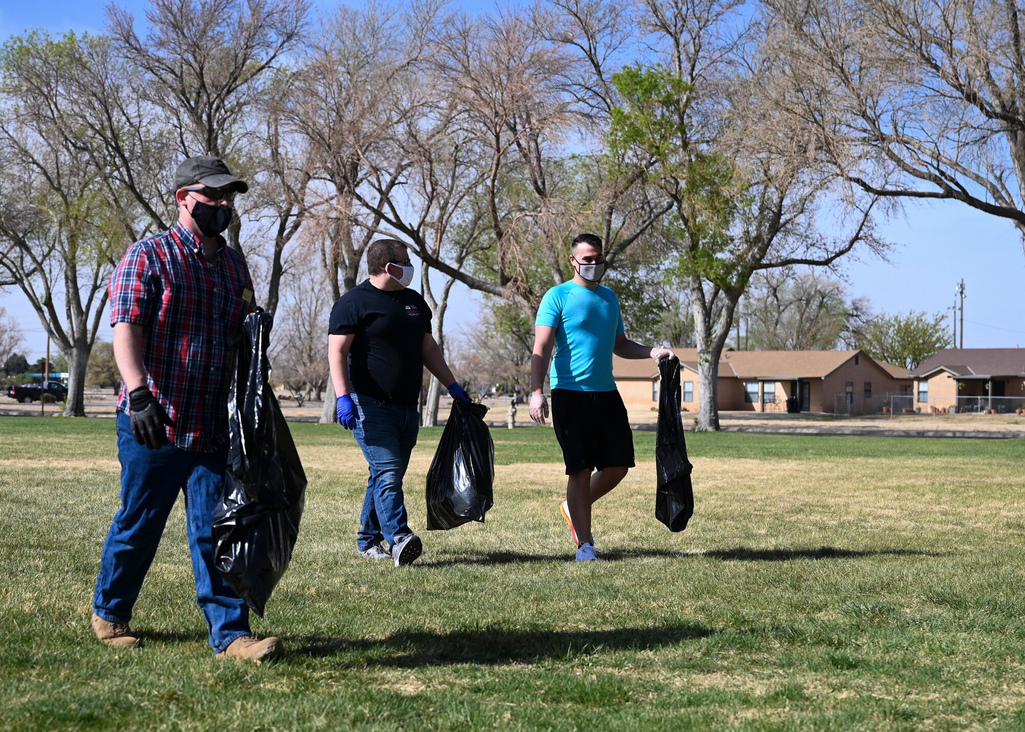 Team Kirtland members pick up trash for Earth Day.