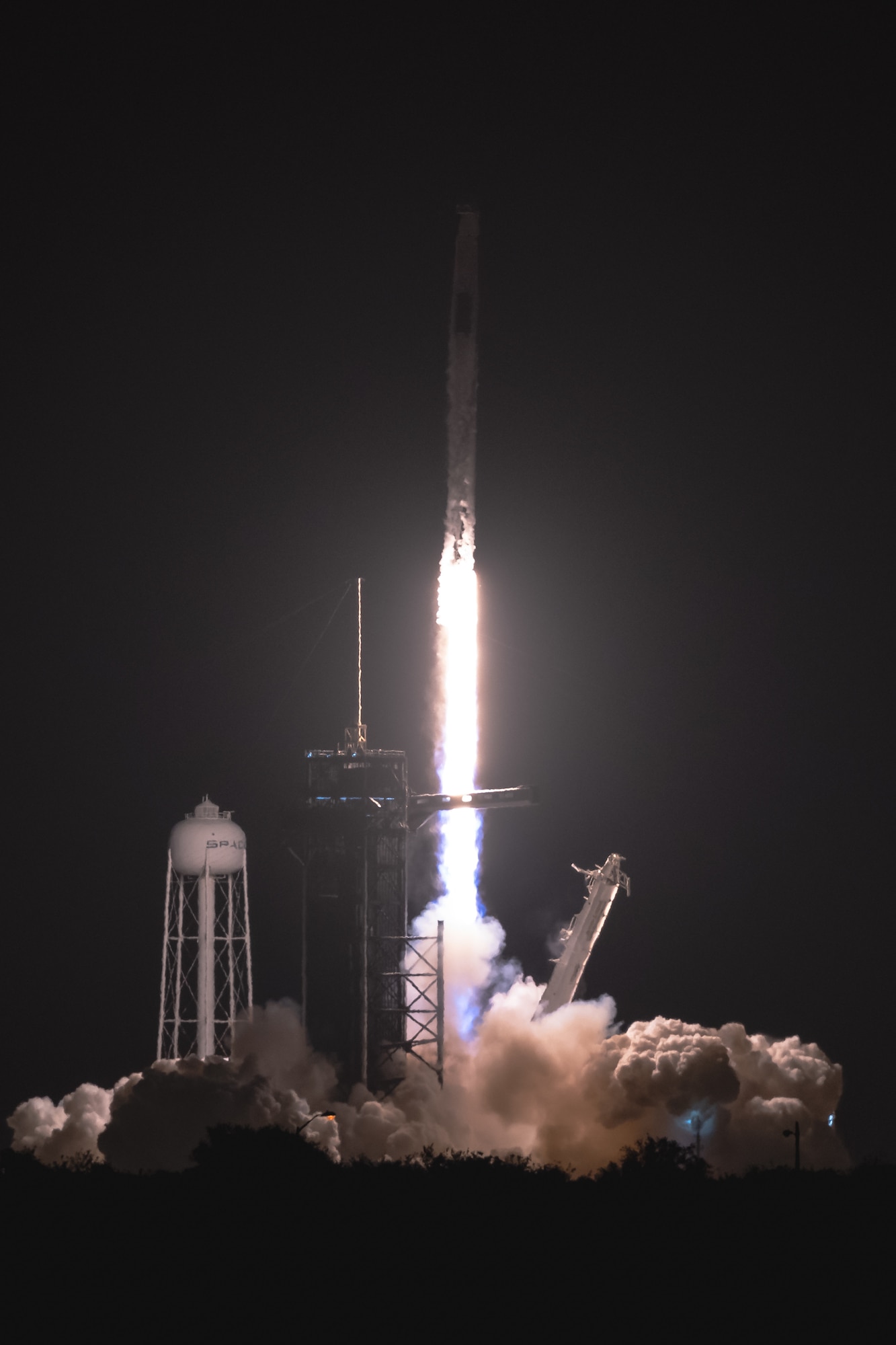 A SpaceX Falcon 9 rocket launches from Space Launch Complex 39A April 23, 2021, at Kennedy Space Center, Florida. The rocket launched the four members of Dragon Crew-2 into space. The astronauts will spend six months on the International Space Station performing a variety of experiments and maintenance actions. (U.S. Space Force photo by Joshua Conti)