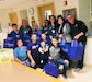 U.S. Air Force Master Sgt. Jessica Roy (center), 103rd Security Forces Squadron S2 intelligence and investigations superintendent and antiterrorism program manager, Marc Spencer (right), and their families deliver gift bags to nurses at the Saint Francis Hospital neonatal intensive care unit in Hartford, Connecticut, on World Prematurity Day, November 17, 2019. Roy and Spencer both had infant sons pass away after being born prematurely and have dedicated the following years to advocacy work with the March of Dimes organization. (Courtesy photo)