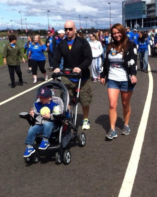 U.S. Air Force Master Sgt. Jessica Roy, 103rd Security Forces Squadron S2 intelligence and investigations superintendent and antiterrorism program manager, with her brother, U.S. Army Maj. Eric Roy, Connecticut Army National Guard Inspector General office, and his son Colton at the Greater Hartford March for Babies at Rentschler Field in East Hartford, Connecticut, April 27, 2014. Roy has dedicated the years following her infant son’s passing in 2012 to advocacy work with the March of Dimes organization. (Courtesy photo)