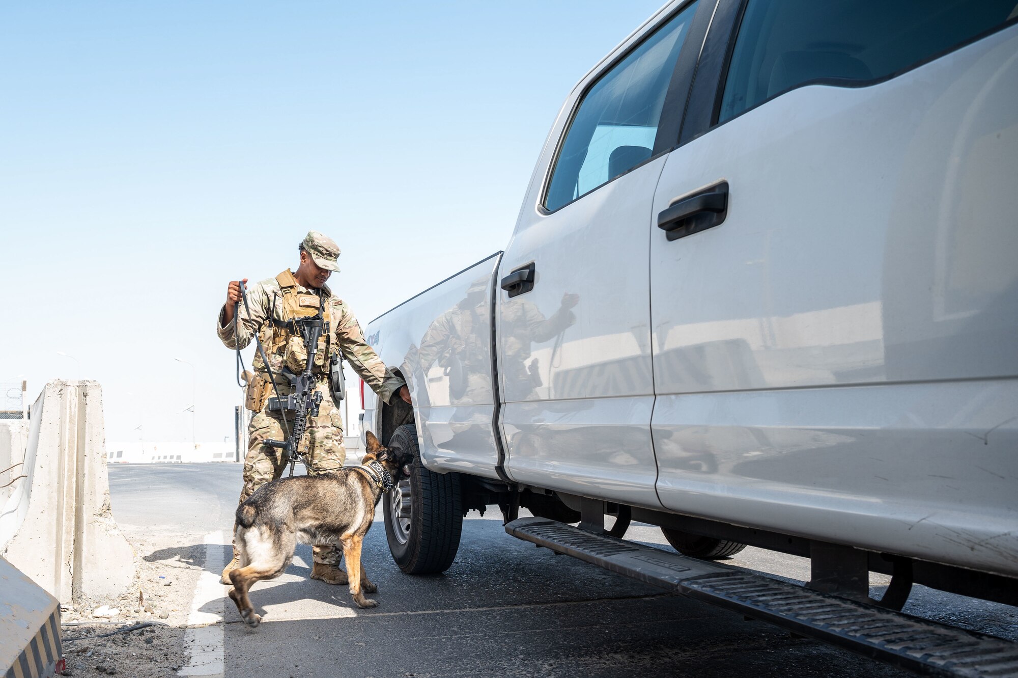 Staff Sgt. Michael Mandel performs a routine vehicle check.