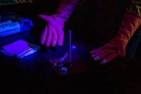 Invented by Dean Luxton in 1968, Glo Germ is a product that is typically used in the medical and food industry fields to show the dangers of cross contamination—and is now an educational tool that Norfolk Naval Shipyard (NNSY) has repurposed to deliver superior radiological contamination training due to the product’s visual properties under a black light.