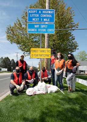 Sailors and civilians from Naval Supply Systems Command (NAVSUP) Business Systems Center (BSC) remove trash and debris from a two-mile stretch of road in Mechanicsburg as part of the Pennsylvania Department of Transportation (PennDOT) state-wide Adopt A Highway program, April 23.