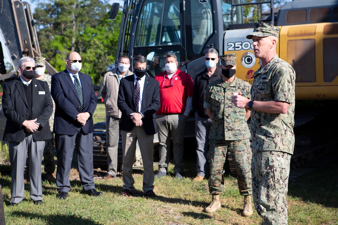 U.S. Navy Capt. Jim Brown, commanding officer, Office in Charge of Construction Florence addresses staff and attendees during a ground-breaking ceremony for the hurricane recovery and military construction projects at Marine Corps Base Camp Lejeune, North Carolina, April 22, 2021.  The ground-breaking ceremony marked the first of seven military construction project packages to replace facilities on MCB Camp Lejeune, Marine Corps Air Station New River and MCAS Cherry Point damaged by Hurricane Florence in September 2018. (U.S. Marine Corps photo by CWO2 Brian Lautenslager)