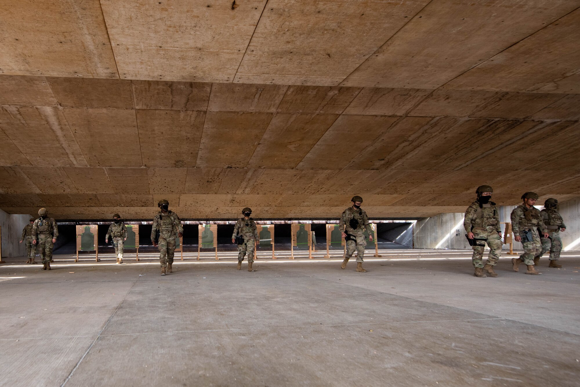 Airmen with the 39th Security Forces Squadron walk to their firing positions during annual combat arms weapons training at Incirlik Air Base, Turkey, April 21, 2021. The 39th SFS provides force protection for Incirlik, its geographically separated units in Turkey, law enforcement services and support for several contingency operations for United States Air Forces in Europe – Air Forces Africa. (U.S. Air Force photo by Senior Airman Derek Seifert)