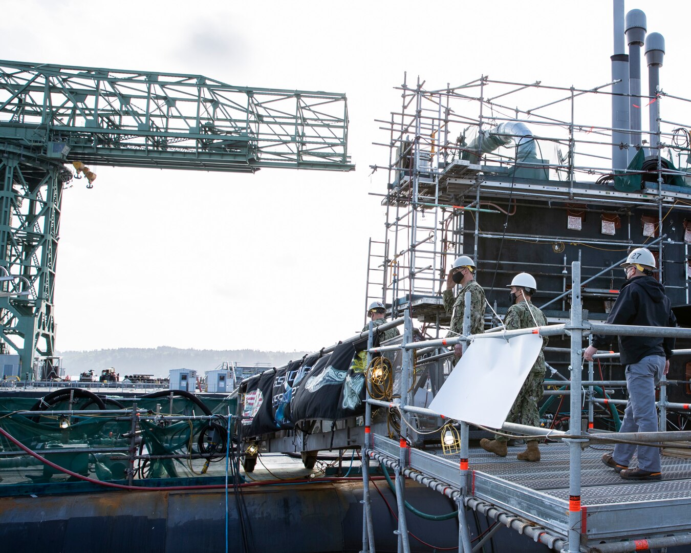 Vice Adm. William J. Galinis, commander, Naval Sea Systems Command, visited Puget Sound Naval Shipyard & Intermediate Maintenance Facility, April 23, 2021, to tour PSNS & IMF facilities, learn about the status of various maintenance availabilities, and to discuss process improvement and transformation efforts.