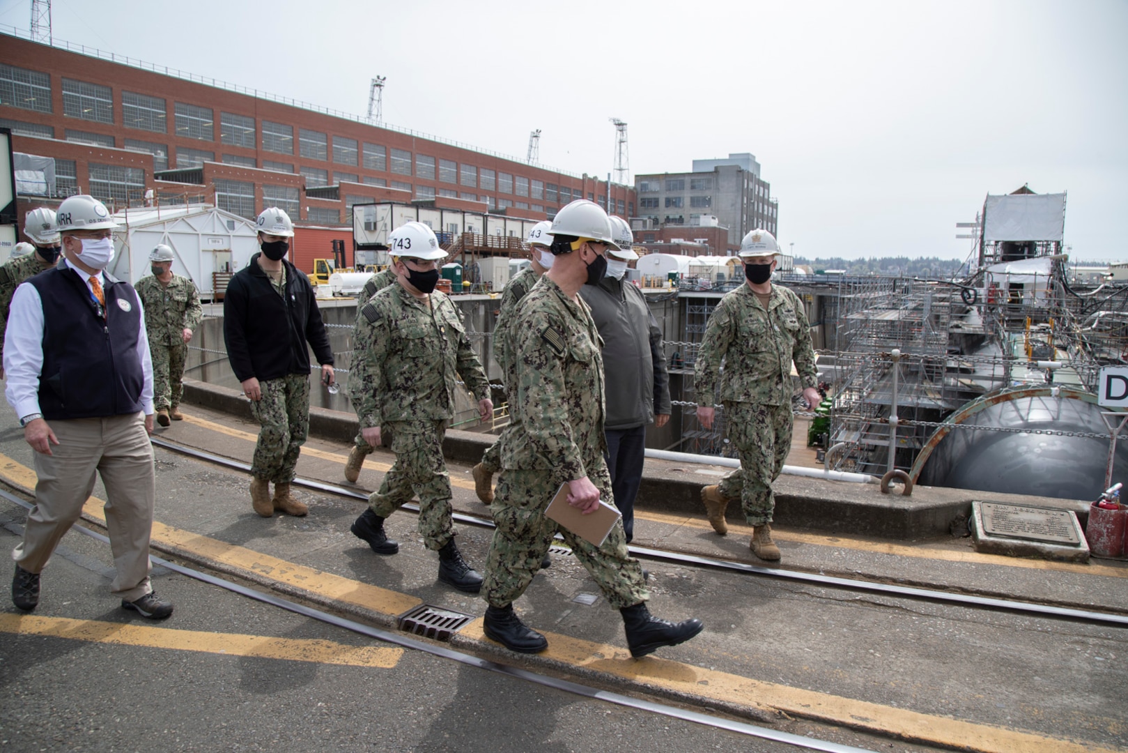 Vice Adm. William J. Galinis, commander, Naval Sea Systems Command, visited Puget Sound Naval Shipyard & Intermediate Maintenance Facility, April 23, 2021, to tour PSNS & IMF facilities, learn about the status of various maintenance availabilities, and to discuss process improvement and transformation efforts.