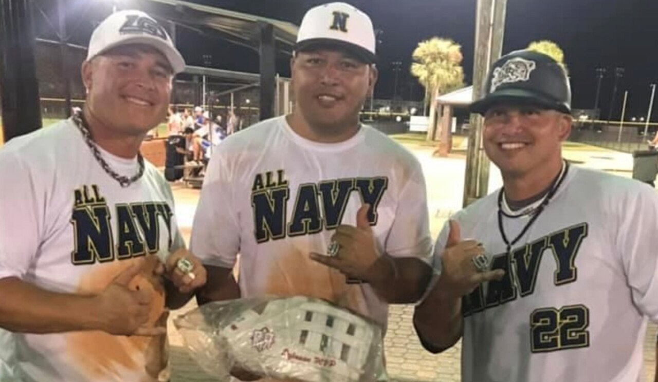 Softball stars pose for photo.