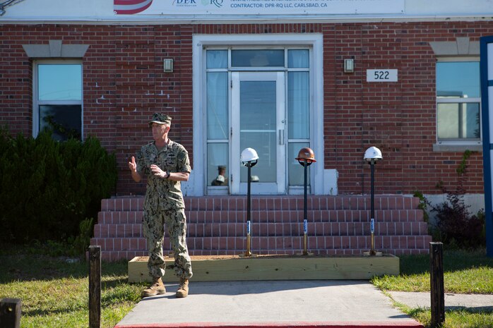 U.S. Navy Capt. Jim Brown, commanding officer, Office in Charge of Construction Florence addresses staff and attendees during a ground-breaking ceremony for the hurricane recovery and military construction projects at Marine Corps Base Camp Lejeune, North Carolina, April 22, 2021.  The ground-breaking ceremony marked the first of seven military construction project packages to replace facilities on MCB Camp Lejeune, Marine Corps Air Station New River and MCAS Cherry Point damaged by Hurricane Florence in September 2018. (U.S. Marine Corps photo by CWO2 Brian Lautenslager)