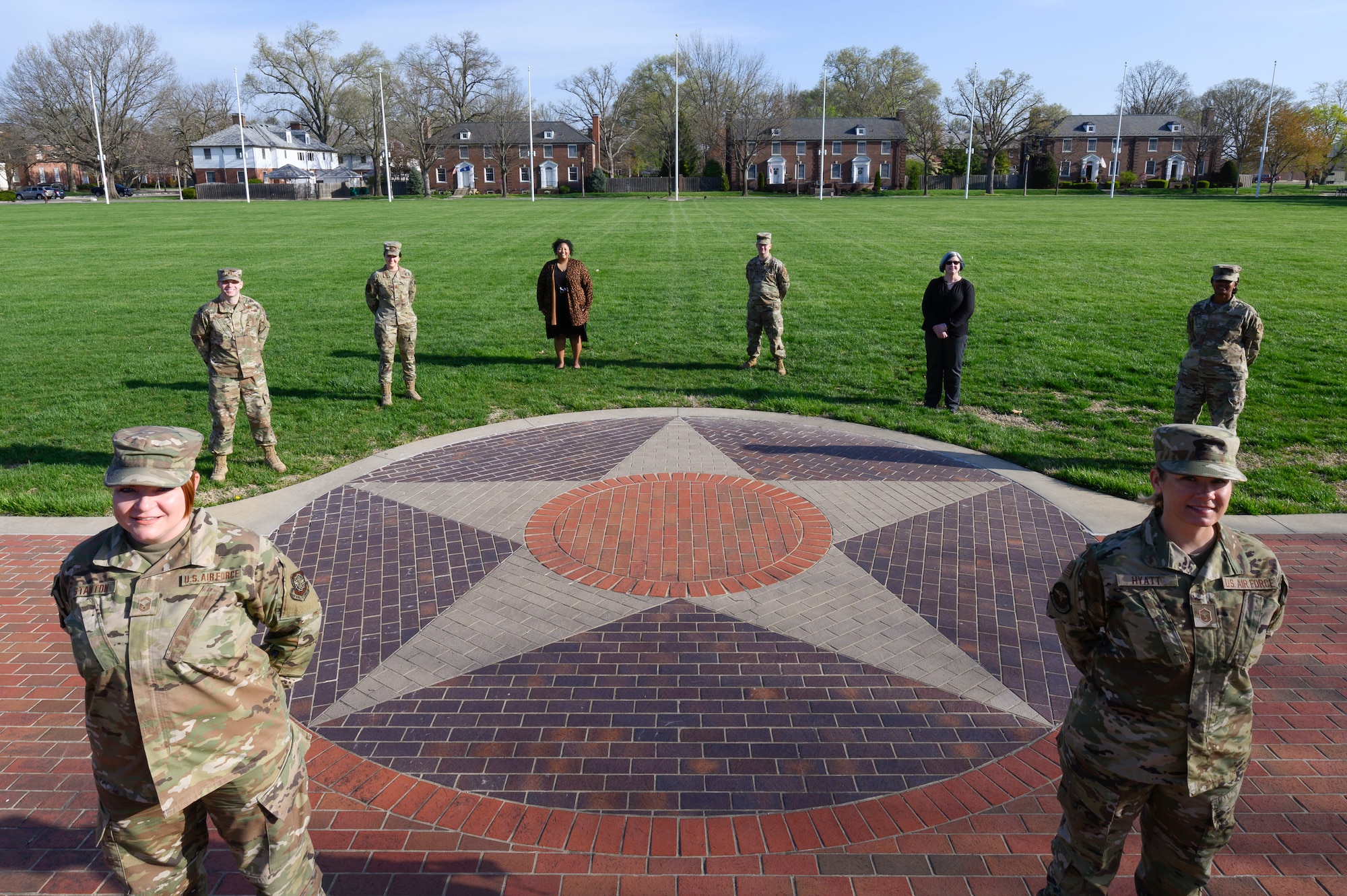375th Sexual Assault Prevention and Response victim advocates pose for a photo at the parade field at Scott Air Force Base, Illinois, April 12, 2021. Victim advocates provide crisis intervention and nonclinical support to sexual assault victims. (U.S. Air Force photo by Senior Airman Dalton Williams)