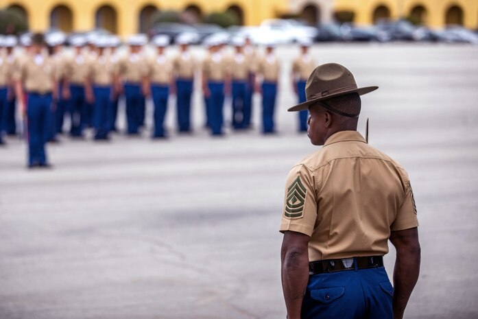 1stSgt. Larry Crumpton, the Company First Sergeant for Charlie Company, 1st Recruit Training Battalion, supervises a graduation at Marine Corps Recruit Depot, San Diego, April 22, 2021.