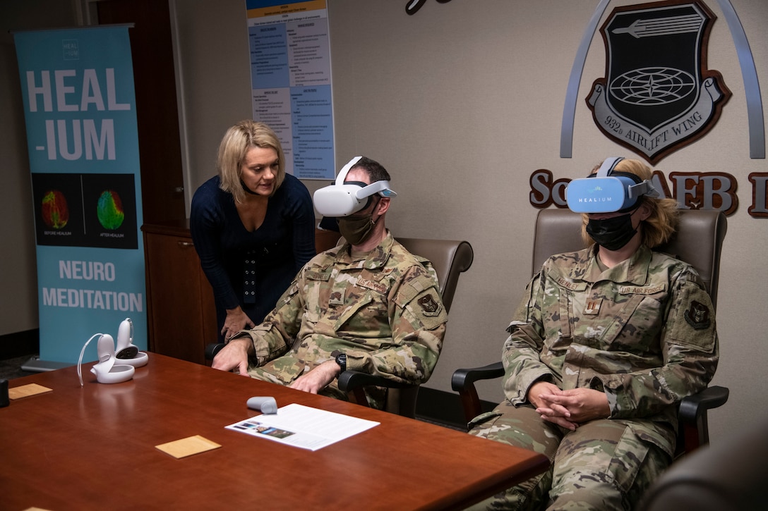 Col. Christopher Spinelli, 932nd Airlift Wing Medical Group, commander tests out virtual reality gear at Scott Air Force Base, Illinois, April 10, 2021. The googles and software are designed to help combat stress and allow for mobile mediation that could help Airman and families relax and find calmness. (U.S. Air Force photo by Senior Airman Brooke Spenner)